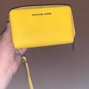 Bright yellow MK wallet